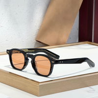 black-w-orange-lens