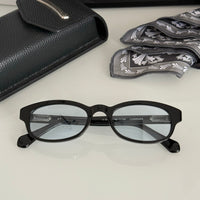black-w-blue-lens